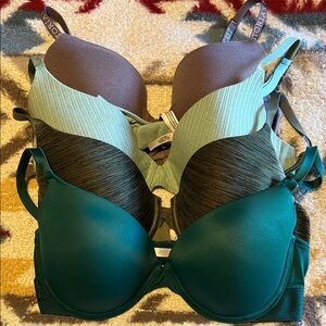 VS bras in purple and greens all 36D